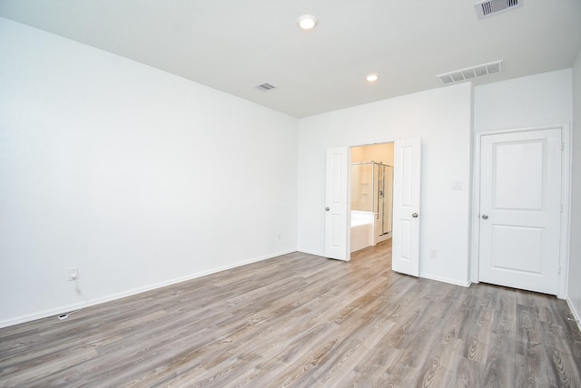7303 Dover View Ln, Katy, TX 77493 - unfurnished bedroom featuring wood finished floors, recessed lighting, and baseboards