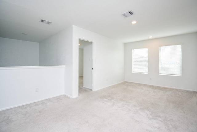 7303 Dover View Ln, Katy, TX 77493 - empty room with light colored carpet, recessed lighting, and baseboards