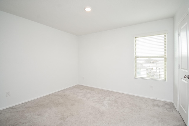 7303 Dover View Ln, Katy, TX 77493 - spare room featuring carpet floors, plenty of natural light, baseboards, and recessed lighting
