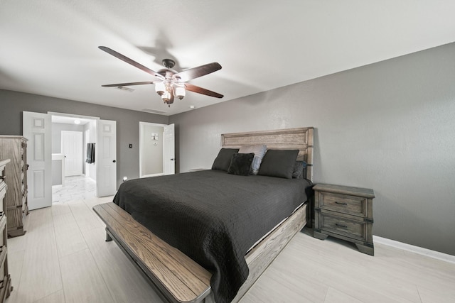 bedroom with baseboards and ceiling fan