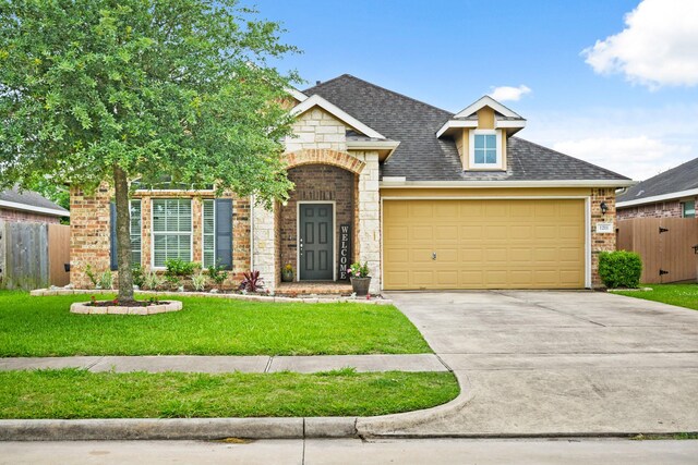 view of front of house with stone siding, concrete driveway, an attached garage, and brick siding