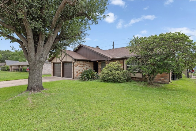view of front of property featuring an attached garage, brick siding, a front lawn, driveway, and a shingled roof