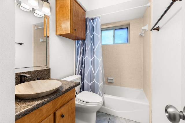 full bath featuring toilet, vanity, shower / bath combo, and tile patterned floors