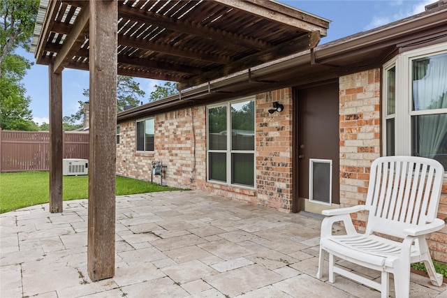 view of patio with a pergola, fence, and ac unit