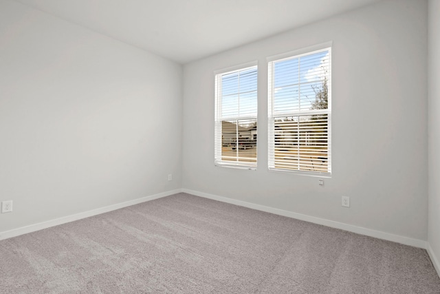 11664 Wilgers Way, Willis, TX 77378 - carpeted empty room featuring baseboards