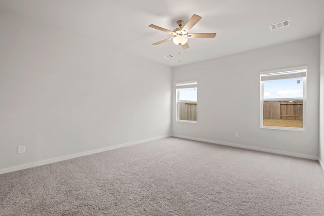 11664 Wilgers Way, Willis, TX 77378 - empty room with ceiling fan, baseboards, and carpet flooring