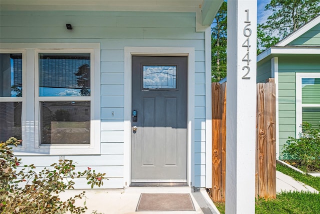 property entrance featuring fence