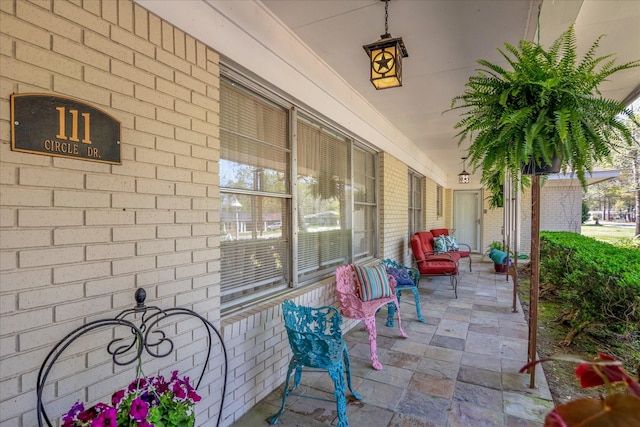 111 Circle Dr, Cleveland, TX 77327 - view of covered porch