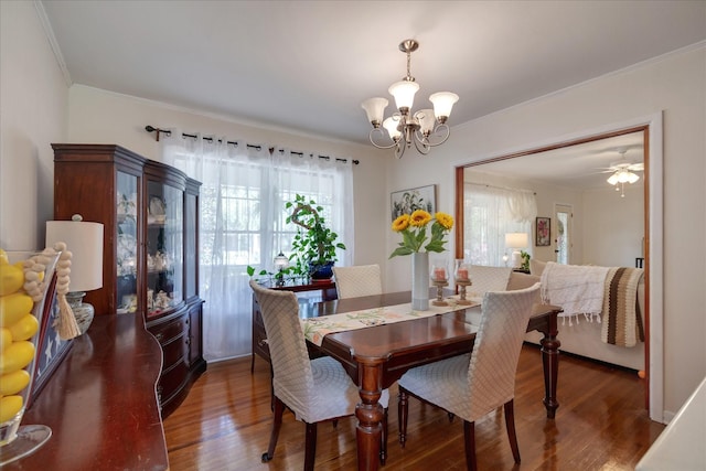 111 Circle Dr, Cleveland, TX 77327 - dining room featuring a chandelier, crown molding, and wood finished floors