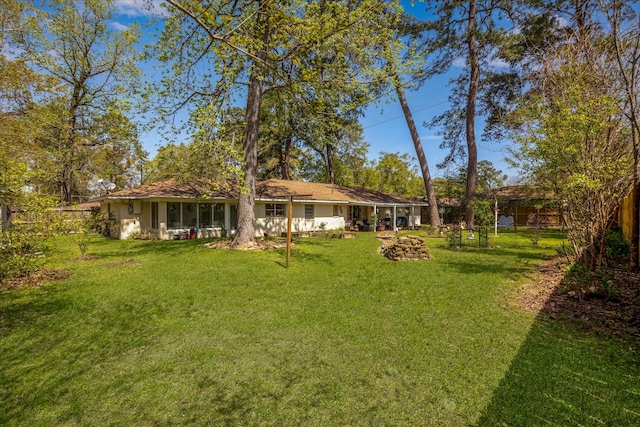 111 Circle Dr, Cleveland, TX 77327 - fenced backyard with a sunroom