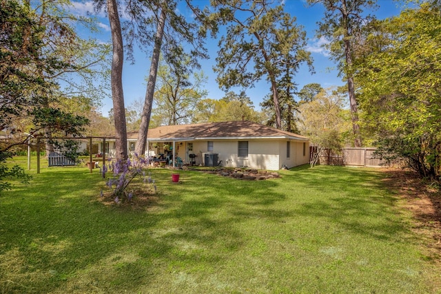 111 Circle Dr, Cleveland, TX 77327 - fenced backyard with a patio