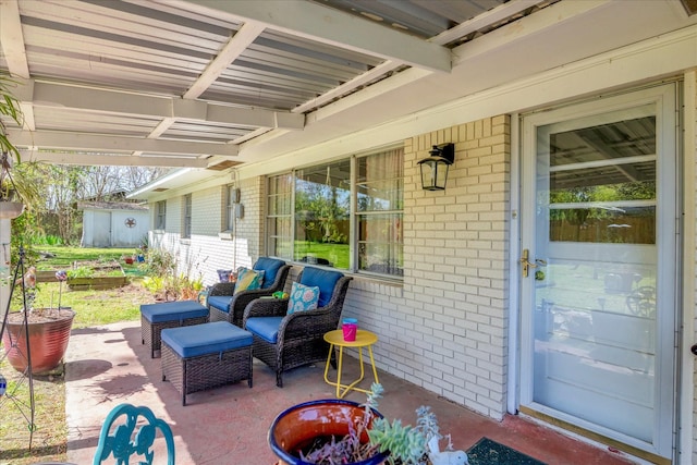 111 Circle Dr, Cleveland, TX 77327 - view of patio / terrace with a shed