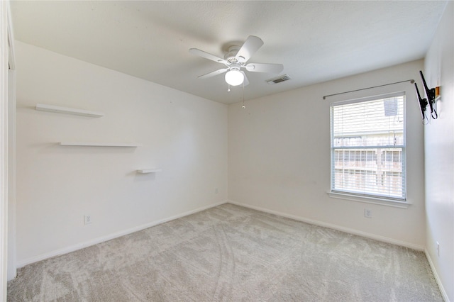 1826 Oak Lodge Dr, Pearland, TX 77581 - unfurnished room with light carpet, ceiling fan, and baseboards