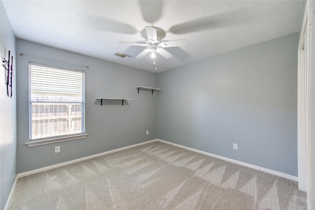1826 Oak Lodge Dr, Pearland, TX 77581 - unfurnished room featuring ceiling fan, light carpet, and baseboards