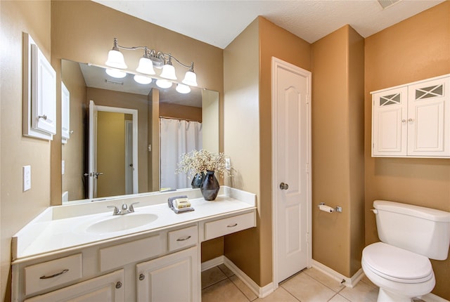 1826 Oak Lodge Dr, Pearland, TX 77581 - bathroom with tile patterned flooring, toilet, and vanity