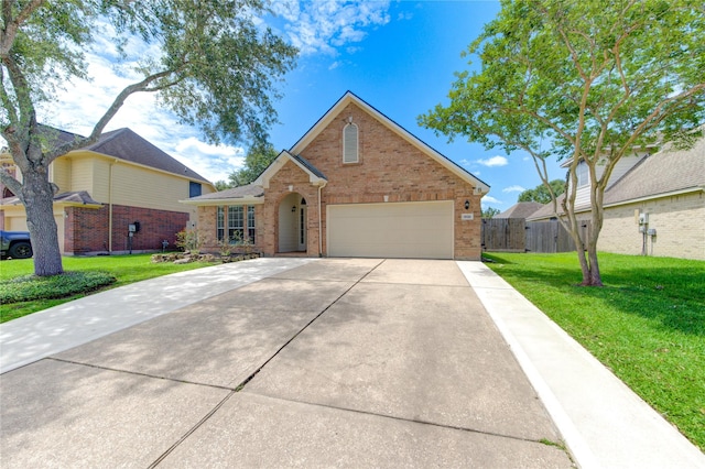 1826 Oak Lodge Dr, Pearland, TX 77581 - traditional home featuring brick siding and driveway