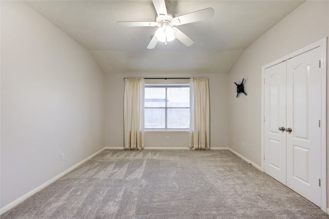 1826 Oak Lodge Dr, Pearland, TX 77581 - carpeted spare room featuring lofted ceiling, a ceiling fan, and baseboards