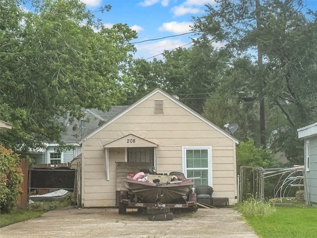 210 Park St, Baytown, TX 77520 - rear view of house with fence