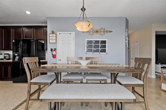 914 Bandon Ln, Houston, TX 77073 - dining space featuring light tile patterned floors, recessed lighting, and baseboards