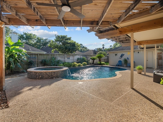 view of swimming pool featuring a ceiling fan, a fenced backyard, a patio, and a pool with connected hot tub