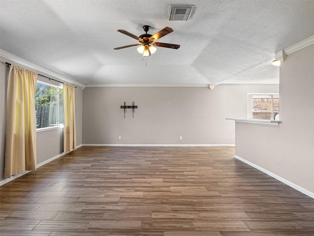 1726 Meadow Green Dr, Missouri City, TX 77489 - unfurnished living room featuring a textured ceiling, ceiling fan, wood finished floors, crown molding, and baseboards