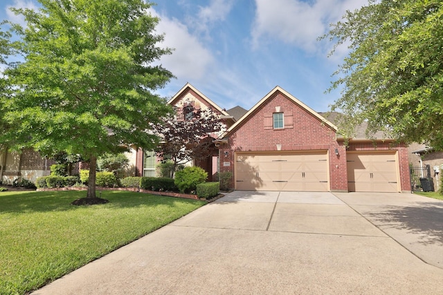 view of front of home featuring brick siding, concrete driveway, a front lawn, and a garage