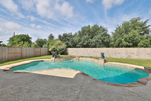 view of pool with a patio area and a fenced backyard
