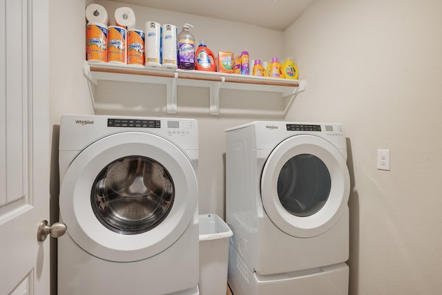 2065 Chief St, Bryan, TX 77807 - clothes washing area featuring separate washer and dryer