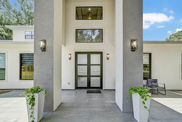 26511 Meadow Ln, Katy, TX 77494 - property entrance with stucco siding and french doors
