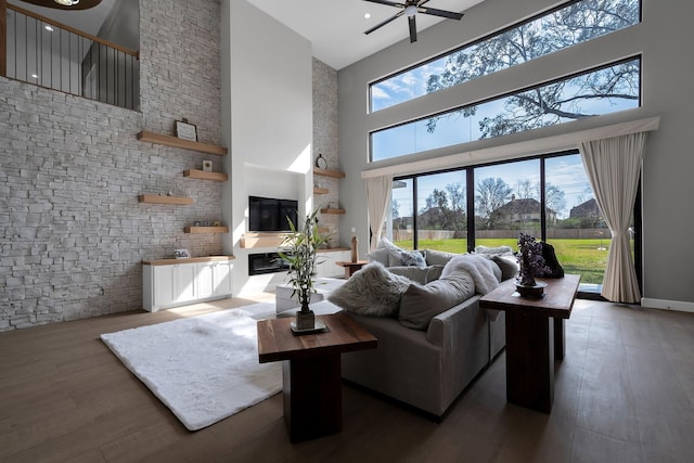 26511 Meadow Ln, Katy, TX 77494 - living room with a high ceiling, wood finished floors, and a ceiling fan