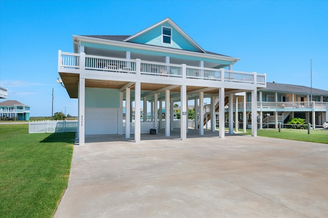 3025 Carioca Ct, Crystal Beach, TX 77650 - coastal home featuring a carport, driveway, and a front yard