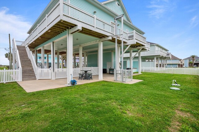 3025 Carioca Ct, Crystal Beach, TX 77650 - rear view of property featuring a patio and a wooden deck