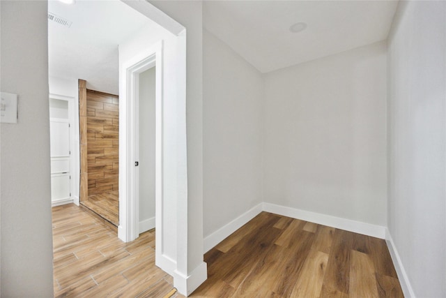 7907 12th Fairway Ln, Humble, TX 77346 - hall featuring wood finished floors and baseboards