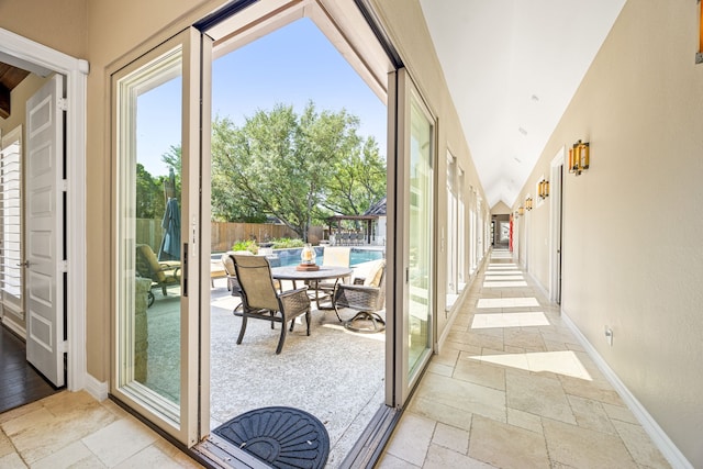 2911 S Saddlebrook Ln, Katy, TX 77494 - doorway to outside with stone tile flooring and plenty of natural light