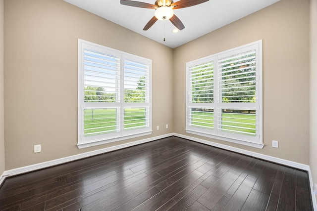 2911 S Saddlebrook Ln, Katy, TX 77494 - unfurnished room featuring a ceiling fan and dark wood-style floors