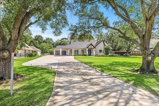 2911 S Saddlebrook Ln, Katy, TX 77494 - view of front of property with concrete driveway and a front yard