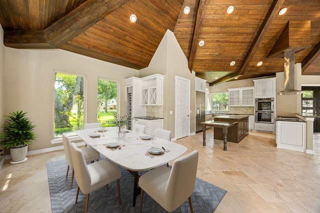 2911 S Saddlebrook Ln, Katy, TX 77494 - dining area featuring a wood ceiling with exposed beams, stone tile floors, recessed lighting, and high vaulted ceiling