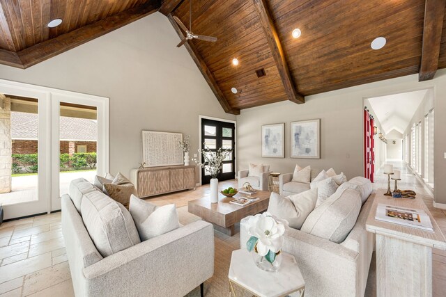 2911 S Saddlebrook Ln, Katy, TX 77494 - living room featuring a wooden ceiling with exposed beams, healthy amount of natural light, high vaulted ceiling, recessed lighting, and stone tile floors