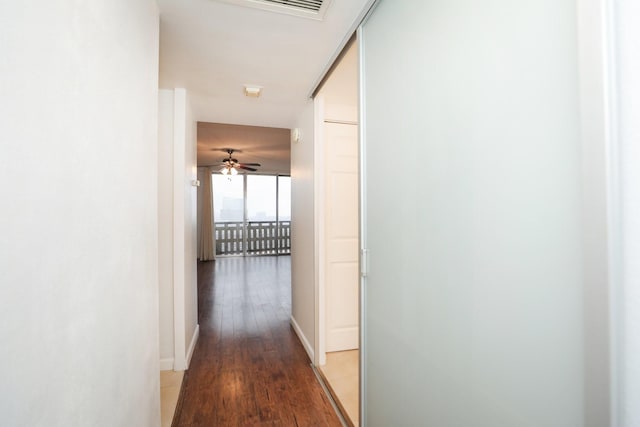 2016 Main St Unit 1208, Houston, TX 77002 - hallway with light wood finished floors and baseboards