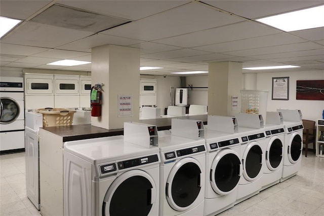 2016 Main St Unit 1208, Houston, TX 77002 - communal laundry room with washer and dryer and stacked washer / drying machine