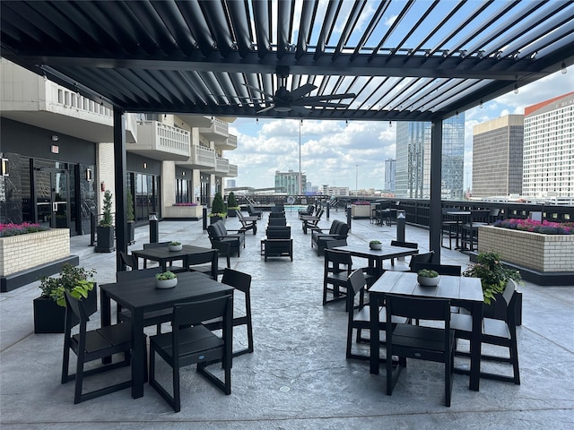 2016 Main St Unit 1208, Houston, TX 77002 - view of patio / terrace featuring outdoor dining area, a city view, a pergola, and a water view