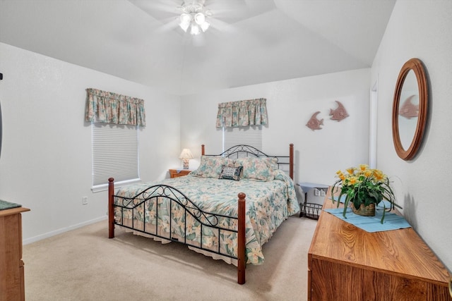carpeted bedroom with baseboards and ceiling fan