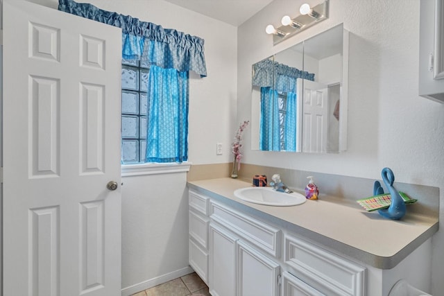 bathroom with vanity and tile patterned floors