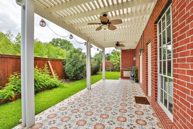 view of patio / terrace featuring a ceiling fan