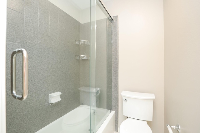 full bathroom with toilet and enclosed tub / shower combo