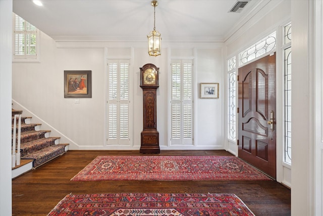 17 Pine Briar Cir, Houston, TX 77056 - entrance foyer featuring wood finished floors, baseboards, ornamental molding, stairs, and a chandelier
