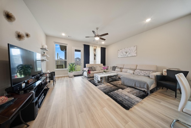 24323 Salts Mill Dr, Katy, TX 77493 - living room with light wood-style flooring, a ceiling fan, and recessed lighting