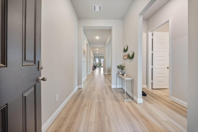 24323 Salts Mill Dr, Katy, TX 77493 - hall featuring light wood-type flooring, baseboards, and recessed lighting