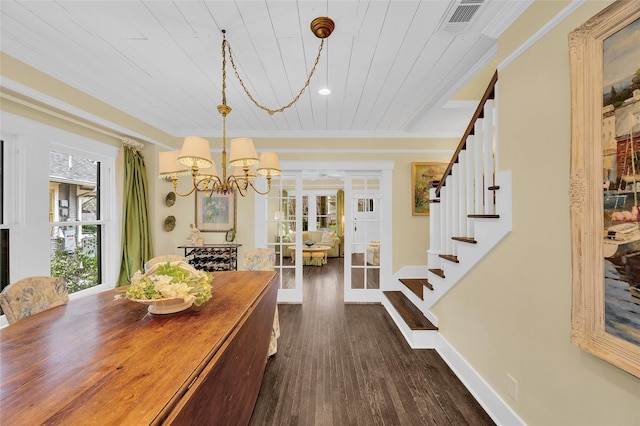 418 Byrne St, Houston, TX 77009 - dining area featuring stairway, a chandelier, dark wood finished floors, crown molding, and wood ceiling