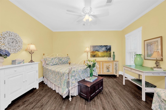 418 Byrne St, Houston, TX 77009 - bedroom featuring dark wood finished floors, ornamental molding, baseboards, and a ceiling fan